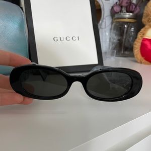 Black authentic Gucci oval sunglasses